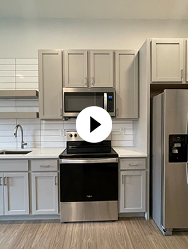 Block20 kitchen with play button overlay