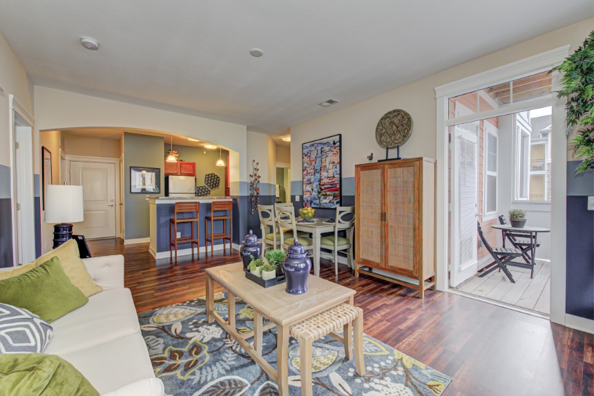 Utilizing furniture that comes with storage space can help keep your Indianapolis apartment organized. Apartment living room in Indianapolis