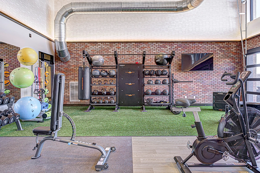 Every fitness lover dreams of new equipment like in this exercise room at The State at Fishers. A modern apartment fitness room